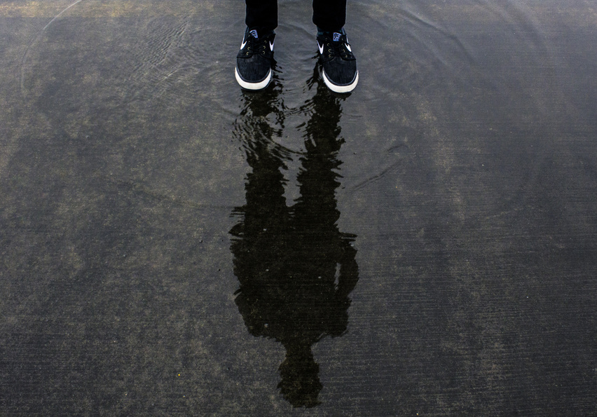 Man Reflection Over the Water